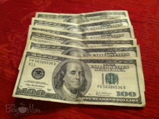 picture of money with Heidi Logo